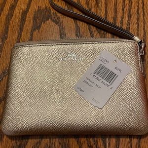 Wristlet. Zipper Top. Slots for 2 credit cards